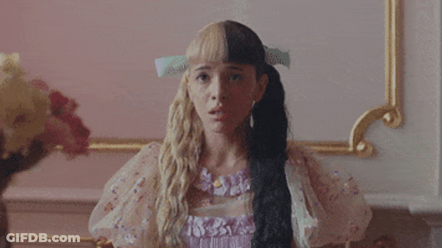 Melanie Martinez Picking Up Telephone GIF