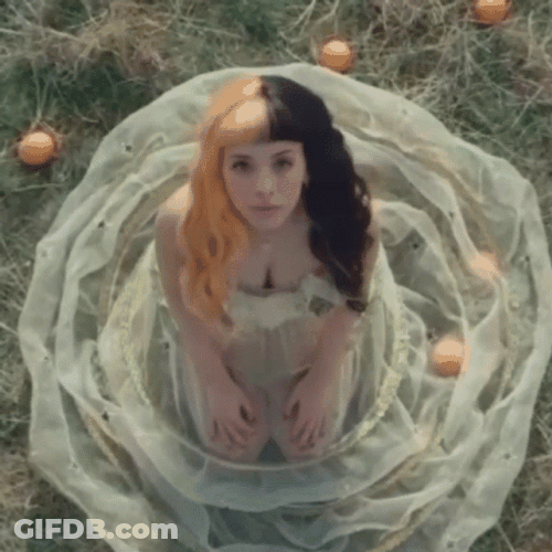 Melanie Martinez Sniffing Orange GIF