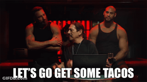 Men At Table Saying Let's Go Get Tacos GIF