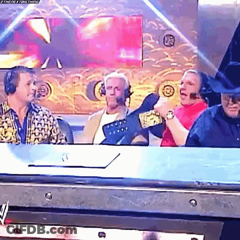 Men At Table With Championship Belt GIF
