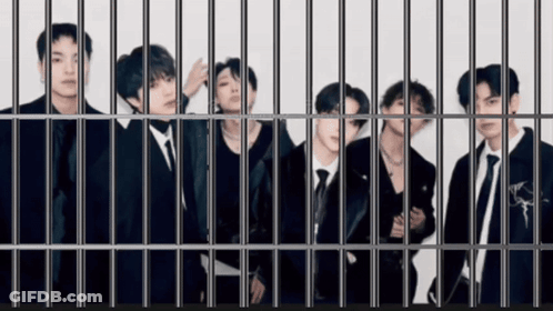 Men Behind Bars In Jail Cell GIF