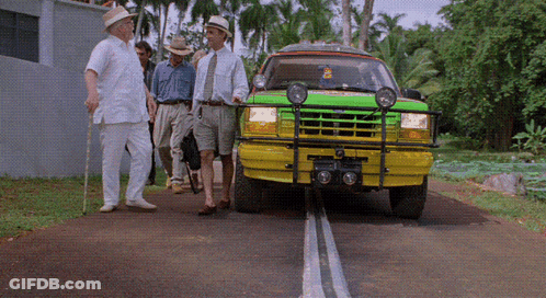 Men Beside Green And Yellow Vehicle License Plate A GIF