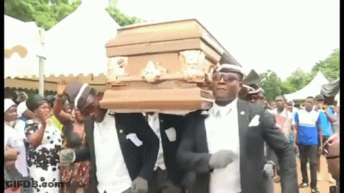 Men Carrying Coffin While Dancing GIF