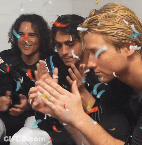 Men Clapping With Falling Confetti GIF