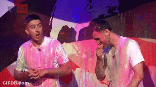 Men Covered In Pink Paint GIF