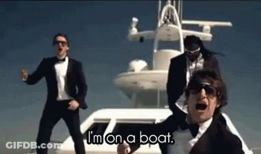 Men Dancing By Boat Saying I'm On A Boat GIF