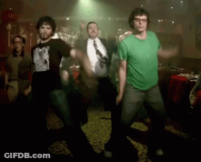 Men Dancing Dark Room, One In Green Shirt GIF