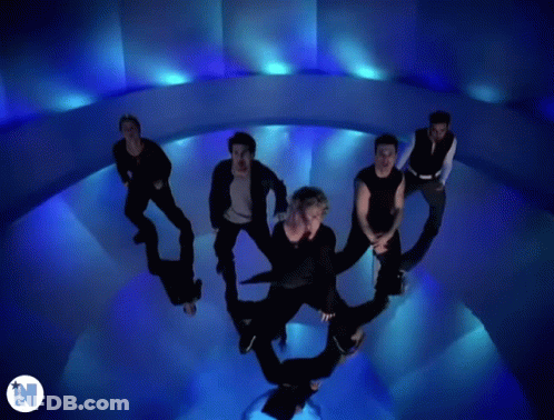 Men Dancing In Blue Room With N GIF