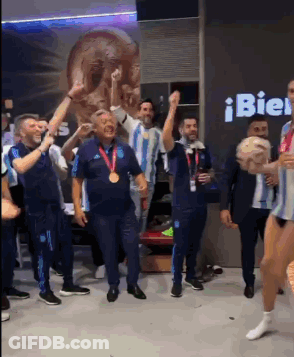 Men Dancing In Front Of Bien Sign GIF