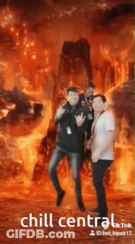 Men Dancing In Front Of Fire Chill Central GIF