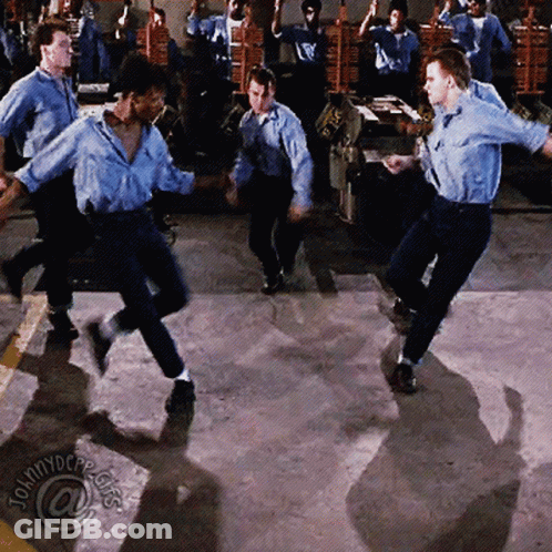 Men Dancing In Front Of Johnny Depp Sign GIF