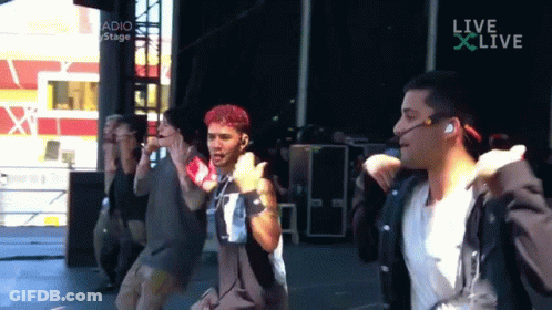 Men Dancing In Front Of Live Screen GIF