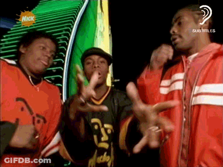 Men Dancing In Front Of Nickelodeon Sign GIF