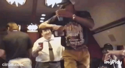Men Dancing In Room With Heavy Metal Shirt GIF