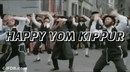 Men Dancing In Street Saying Happy Yom Kippur GIF