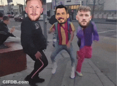 Men Dancing On Sidewalk With Faces On Ground GIF