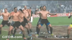 Men Dancing On Soccer Field With Seven Sign GIF