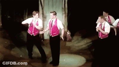 Men Dancing On Stage GIF