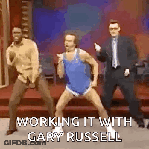 Men Dancing On Stage Working It With Gary Russell GIF