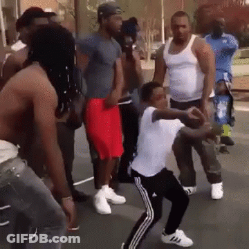Men Dancing On Street One Wearing Adidas Shoes GIF