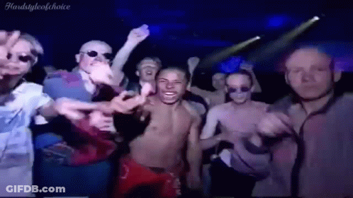 Men Dancing Shirtless In Dark Room GIF