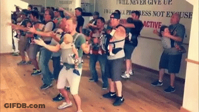 Men Holding Babies While Dancing GIF