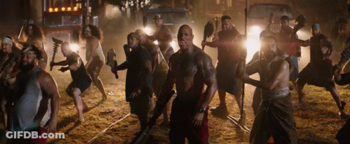Men Holding Weapons In Line GIF