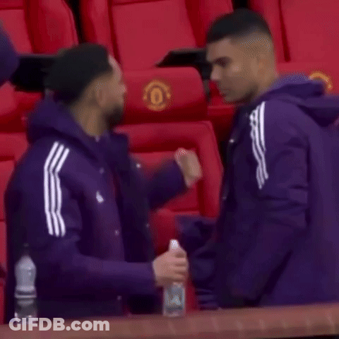 Men Hugging In Stadium GIF