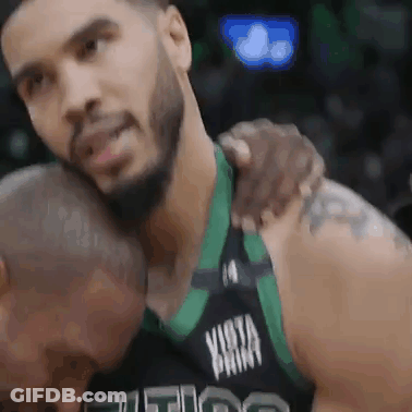 Men Hugging Jerseys GIF