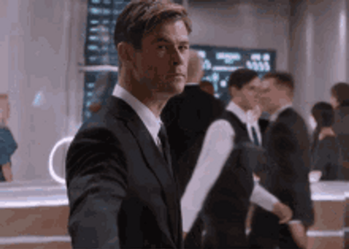 Men In Black Hemsworth Pointing GIF