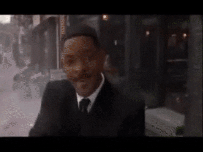 Men In Black Shoots The Car GIF