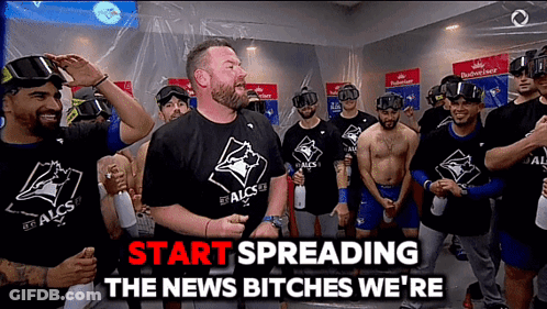 Men In Blue Jays Shirts Standing Together GIF