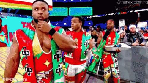 Men In Christmas Outfits In Wrestling Ring GIF
