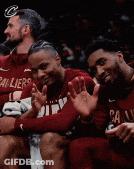 Men In Cleveland Cavaliers Jerseys Sitting GIF