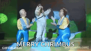 Men In Costumes Dancing With Merry Chrimbos GIF