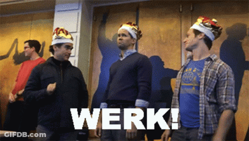 Men In Crowns Standing In Front Of Werk Wall GIF