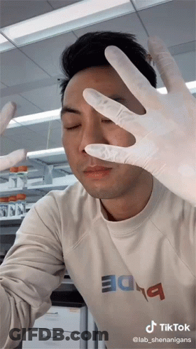 Men In Dark Room Wearing Thieves Shirts GIF
