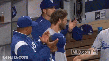 Men In Dodgers Hats Clapping In Dugout GIF