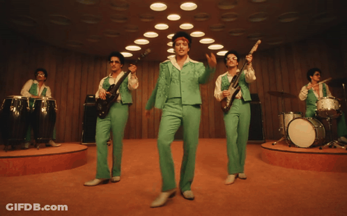 Men In Green Suits Playing Instruments GIF