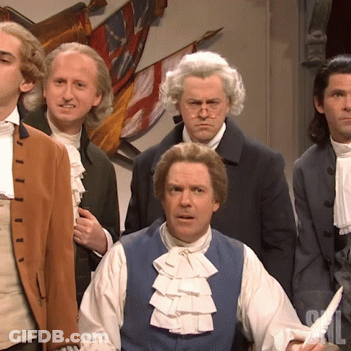 Men In Historical Costumes With Blue Vest And Ruffles GIF