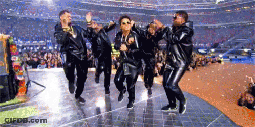 Men In Leather Jackets Dancing On Stage GIF