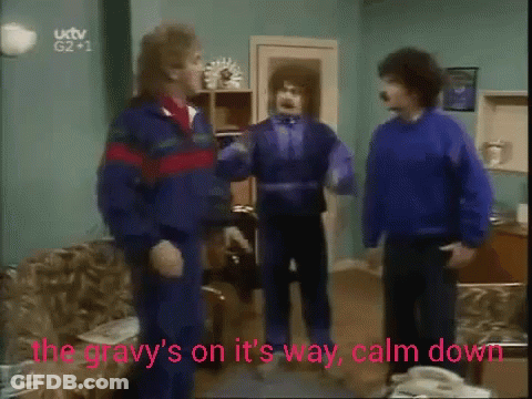 Men In Living Room Gravy's On Its Way Calm Down GIF