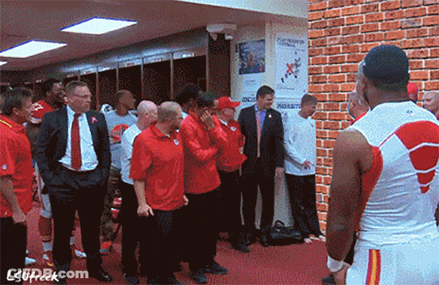 Men In Locker Room With Lsufreek Sign GIF