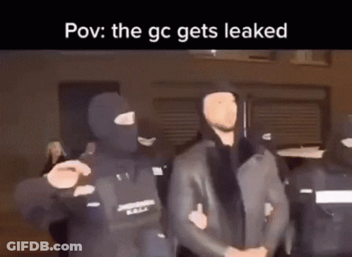 Men In Masks Standing Together GIF