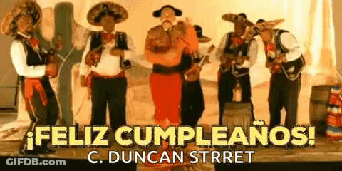 Men In Mexican Costumes Playing Instruments GIF