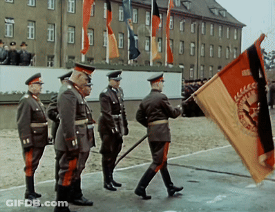 Men In Military Uniforms Carrying CCCP Flag GIF