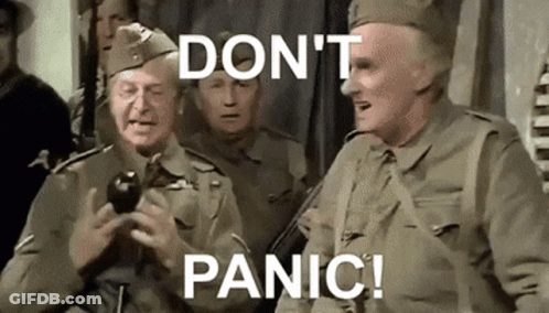 Men In Military Uniforms Holding Bomb GIF