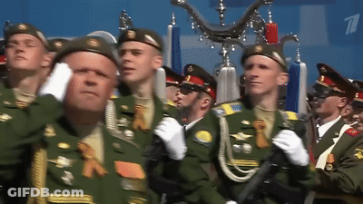 Men In Military Uniforms Marching GIF