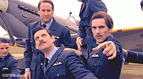 Men In Military Uniforms Posing In Front Of Plane GIF