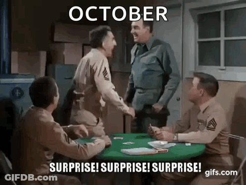 Men In Military Uniforms Sitting Around Table GIF